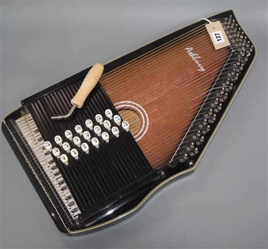 An Ashbury 21 Bar Deluxe Autoharp with tuning wrench